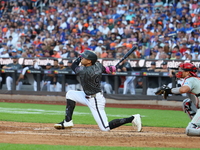 Brandon Nimmo #9 of the New York Mets singles during the seventh inning of the baseball game against the Philadelphia Phillies at Citi Field...