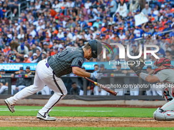 Pete Alonso #20 of the New York Mets is hit by a pitch during the seventh inning of the baseball game against the Philadelphia Phillies at C...