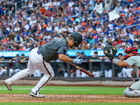 Pete Alonso #20 of the New York Mets is hit by a pitch during the seventh inning of the baseball game against the Philadelphia Phillies at C...