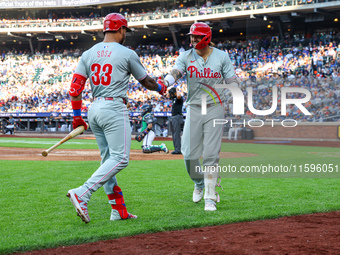 Nick Castellanos #8 of the Philadelphia Phillies is congratulated after homering during the fifth inning of a baseball game against the New...