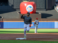 Francisco Alvarez #4 of the New York Mets rounds the bases after homering during the second inning of the baseball game against the Philadel...