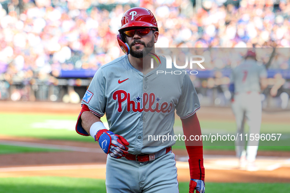 Philadelphia Phillies' Kyle Schwarber #12 is congratulated after homering during the first inning of a baseball game against the New York Me...