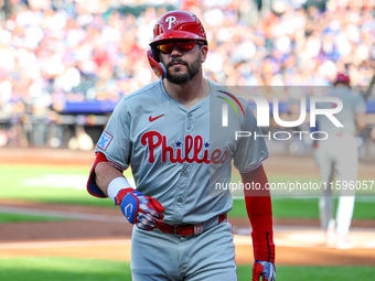 Philadelphia Phillies' Kyle Schwarber #12 is congratulated after homering during the first inning of a baseball game against the New York Me...