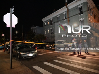 Police investigate the crime scene where a 26-year-old man is shot in the Highland Park section of Brooklyn, New York, United States, on Sep...