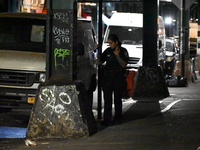 Police investigate the crime scene where a 26-year-old man is shot in the Highland Park section of Brooklyn, New York, United States, on Sep...