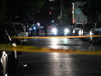 Police investigate the crime scene where a 26-year-old man is shot in the Highland Park section of Brooklyn, New York, United States, on Sep...