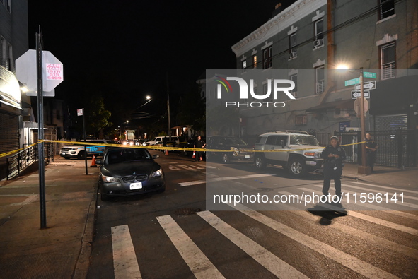 Police investigate the crime scene where a 26-year-old man is shot in the Highland Park section of Brooklyn, New York, United States, on Sep...