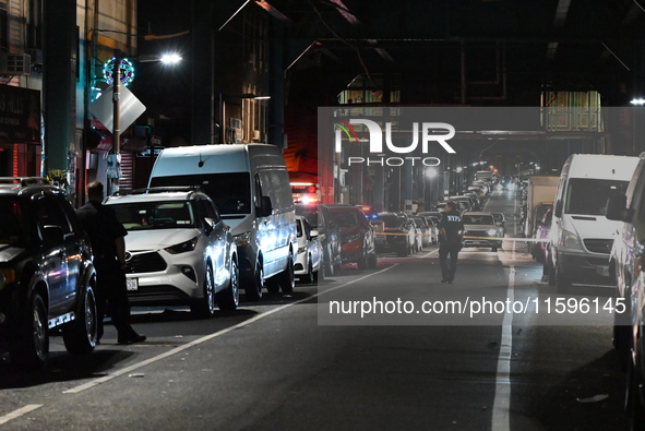 Police investigate the crime scene where a 26-year-old man is shot in the Highland Park section of Brooklyn, New York, United States, on Sep...