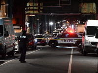 Police investigate the crime scene where a 26-year-old man is shot in the Highland Park section of Brooklyn, New York, United States, on Sep...