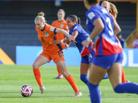 Taylor Suarez of the United States and Kealyn Manou Sigrid Thomas of the Netherlands fight for the ball during the FIFA U-20 Women's World C...