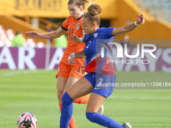 Savannah King of the United States and Diana Apollonia Remmers of the Netherlands fight for the ball during the FIFA U-20 Women's World Cup...