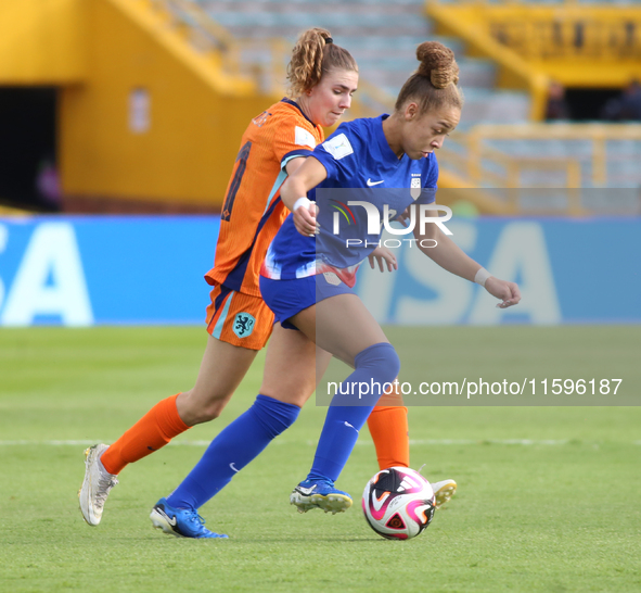 Savannah King of the United States and Diana Apollonia Remmers of the Netherlands fight for the ball during the FIFA U-20 Women's World Cup...