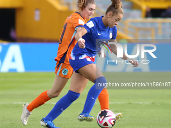 Savannah King of the United States and Diana Apollonia Remmers of the Netherlands fight for the ball during the FIFA U-20 Women's World Cup...