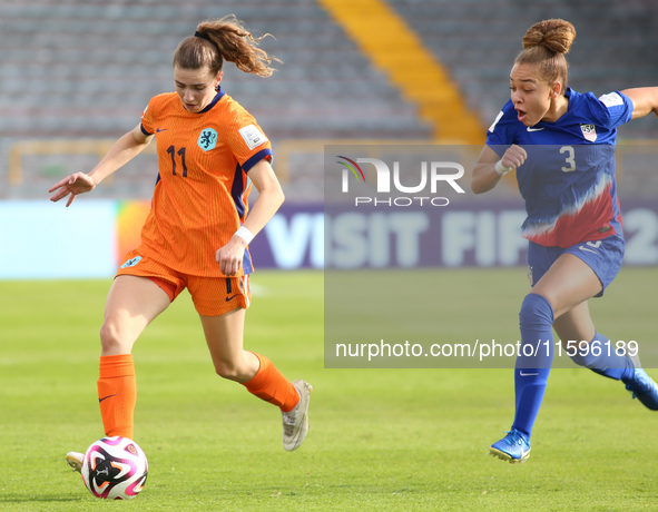 Savannah King of the United States and Diana Apollonia Remmers of the Netherlands fight for the ball during the FIFA U-20 Women's World Cup...