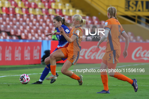 Leah Klenke of the United States and Bo van Egmond of the Netherlands fight for the ball during the FIFA U-20 Women's World Cup third-place...