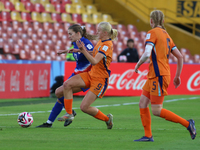 Leah Klenke of the United States and Bo van Egmond of the Netherlands fight for the ball during the FIFA U-20 Women's World Cup third-place...