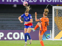 Heather Suzanne Gilchrist of the United States and Eva Elisabeth Geertruida Oude Elberink of the Netherlands fight for the ball during the W...