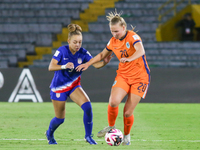 Savannah King of the United States and Fieke Kroese of the Netherlands fight for the ball during the FIFA U-20 Women's World Cup third-place...