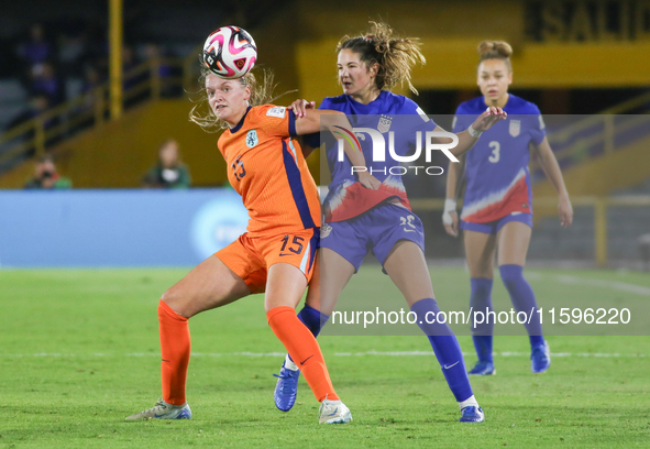 Riley Jackson of the United States and Jet van Beijeren of the Netherlands fight for the ball during the FIFA U-20 Women's World Cup Colombi...