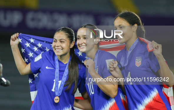 Emeri Adames, Ally Lemos, and Jordyn Bugg of the United States celebrate victory during the FIFA U-20 Women's World Cup Colombia 2024 third-...