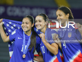 Emeri Adames, Ally Lemos, and Jordyn Bugg of the United States celebrate victory during the FIFA U-20 Women's World Cup Colombia 2024 third-...