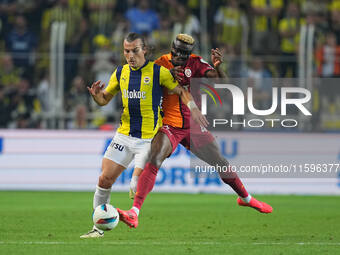 Çağlar Söyüncü of Fenerbahce and Victor Osimhen of Galatasaray battle for the ball during the Turkey Süper Ligue Round 5 between Fenerbahçe...