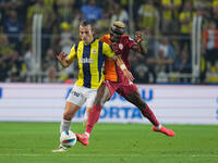 Çağlar Söyüncü of Fenerbahce and Victor Osimhen of Galatasaray battle for the ball during the Turkey Süper Ligue Round 5 between Fenerbahçe...