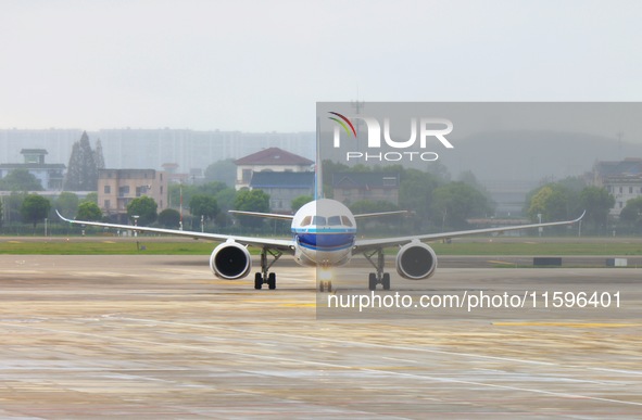 China Southern Airlines' first C919 aircraft arrives at Hangzhou Xiaoshan International Airport from Guangzhou in Hangzhou, Zhejiang provinc...