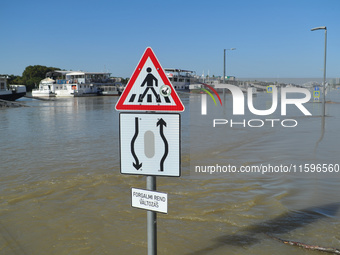 A traffic sign is submerged on the bank of the Danube in Budapest, Hungary, as the peak water levels of the Danube are expected to hit today...