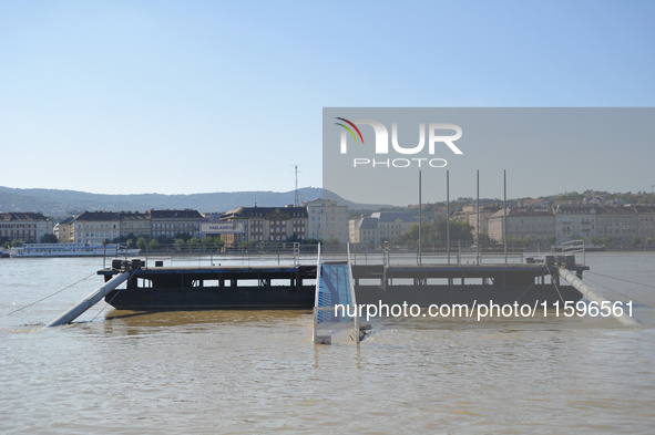 A boat station is underwater on the bank of the Danube in Budapest, Hungary, as the peak water levels of the Danube are expected to hit toda...