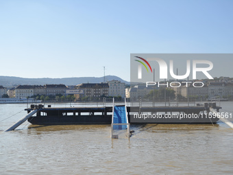 A boat station is underwater on the bank of the Danube in Budapest, Hungary, as the peak water levels of the Danube are expected to hit toda...