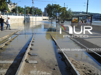 Tram tracks flood on the bank of the Danube in Budapest, Hungary, as the peak water levels of the Danube are expected to hit today. (