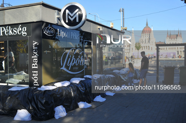 A metro station is closed and covered by sandbags on the bank of the Danube in Budapest, Hungary, as the peak water levels of the Danube are...