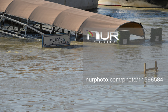 A boat docks on the bank of the Danube in Budapest, Hungary, as the peak water levels of the Danube are expected to hit today. 