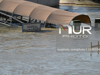 A boat docks on the bank of the Danube in Budapest, Hungary, as the peak water levels of the Danube are expected to hit today. (