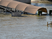 A boat docks on the bank of the Danube in Budapest, Hungary, as the peak water levels of the Danube are expected to hit today. (