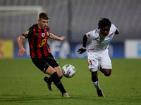 Oluwatobiloba Dimeji Awosanya (R) of Balzan competes for the ball with Sven Xerri (L) of Hamrun Spartans during the Malta 360 Sports Premier...