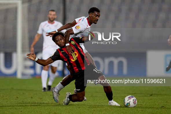 Joseph Mbong of Hamrun Spartans competes for the ball with Udoyen Alexander Ayo Akpan of Balzan during the Malta 360 Sports Premier League s...