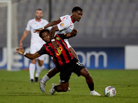 Joseph Mbong of Hamrun Spartans competes for the ball with Udoyen Alexander Ayo Akpan of Balzan during the Malta 360 Sports Premier League s...