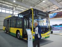 Visitors view a ''pure electric bus'' at the 16th International Transportation Technology and Equipment Exhibition in Beijing, China, on Sep...