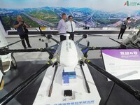 Visitors view the ''Hydrogen Spin 4 hydrogen-powered drone'' at the 16th International Transportation Technology and Equipment Exhibition in...