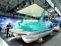 Visitors view a ''hydrogen yacht'' at the 16th International Transportation Technology and Equipment Exhibition in Beijing, China, on Septem...