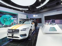 Visitors view a ''Didi self-driving car'' at the 16th International Transportation Technology and Equipment Exhibition in Beijing, China, on...