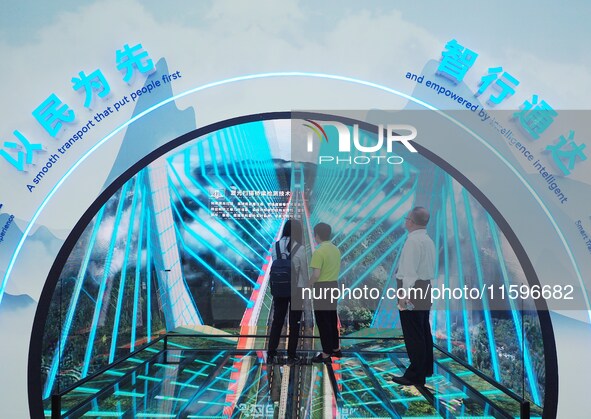 Visitors have an immersive smart transportation experience at the 16th International Transportation Technology and Equipment Exhibition in B...