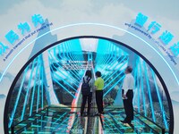 Visitors have an immersive smart transportation experience at the 16th International Transportation Technology and Equipment Exhibition in B...