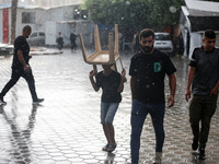 A view of rainfall at Al-Aqsa Martyrs Hospital in Deir al-Balah, central Gaza Strip, on September 22, 2024, amid the ongoing war between Isr...