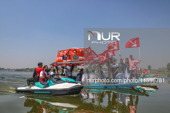 Omar Abdullah, the leader of Jammu and Kashmir National Conference (JKNC), right, Tanvir Sadiq, candidate of Jammu and Kashmir National Conf...