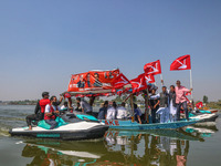 Omar Abdullah, the leader of Jammu and Kashmir National Conference (JKNC), right, Tanvir Sadiq, candidate of Jammu and Kashmir National Conf...