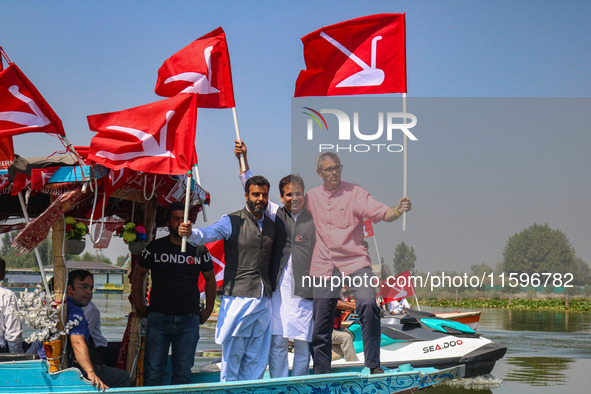 Omar Abdullah, the leader of Jammu and Kashmir National Conference (JKNC), right, Tanvir Sadiq, candidate of Jammu and Kashmir National Conf...