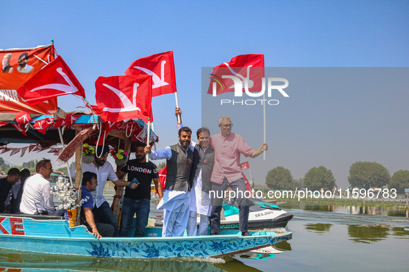 Omar Abdullah, the leader of Jammu and Kashmir National Conference (JKNC), right, Tanvir Sadiq, candidate of Jammu and Kashmir National Conf...